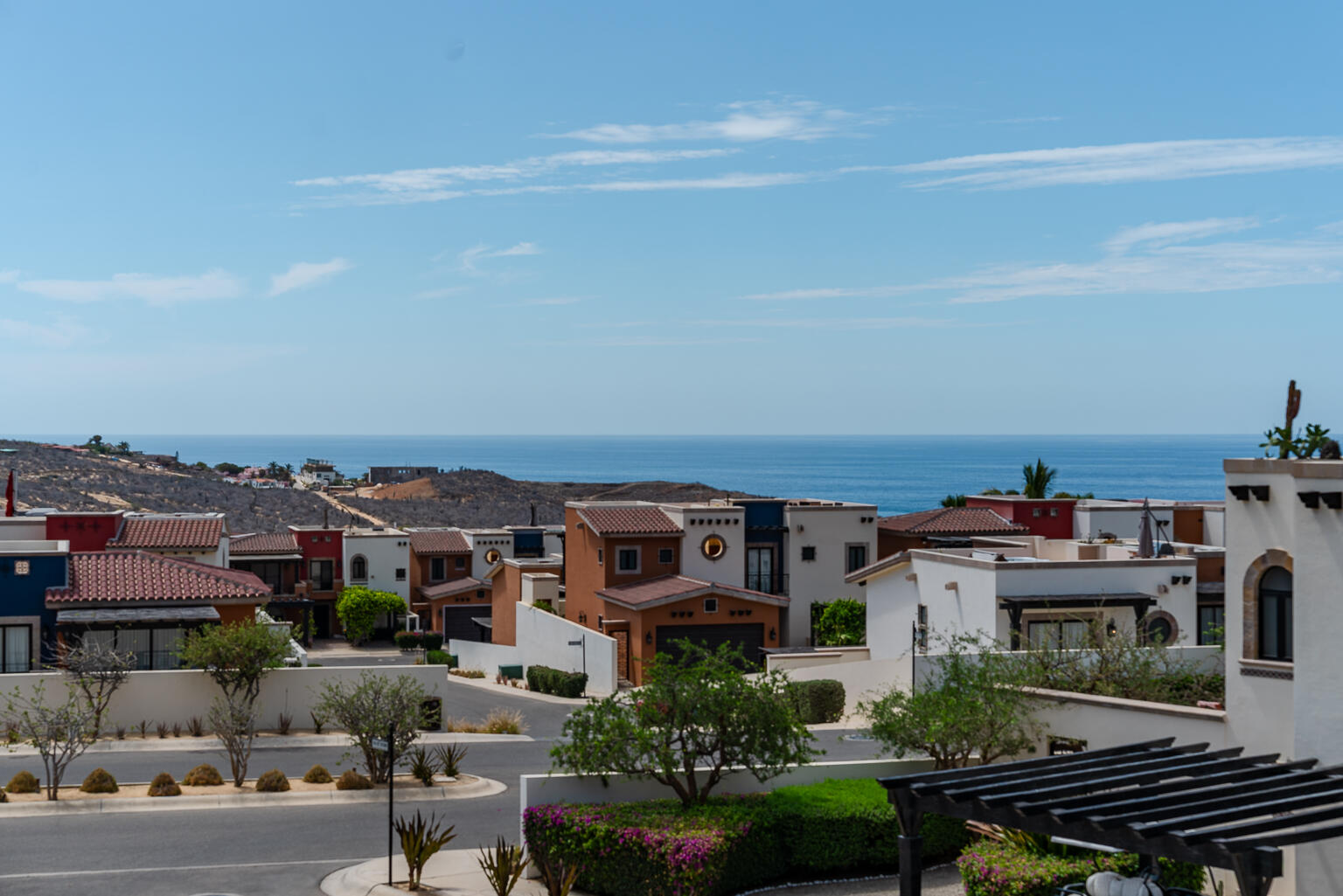 Quivira Copala Villa 37 in Copala is the turnkey Cabo home you've been waiting for. This 3-bedroom, 2.5-bath Aira model offers an open layout filled with natural light, perfect for relaxing or entertaining. The spacious patio is ready for a splash pool and/or outdoor kitchen—your future memories start here. Upstairs, each bedroom has its own private balcony or sitting area, and the rooftop delivers panoramic ocean – Seller Financing, Pacific, BS